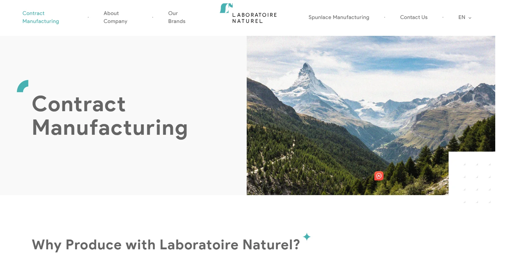 Website header featuring contract manufacturing text alongside a scenic mountain landscape, emphasizing nature.